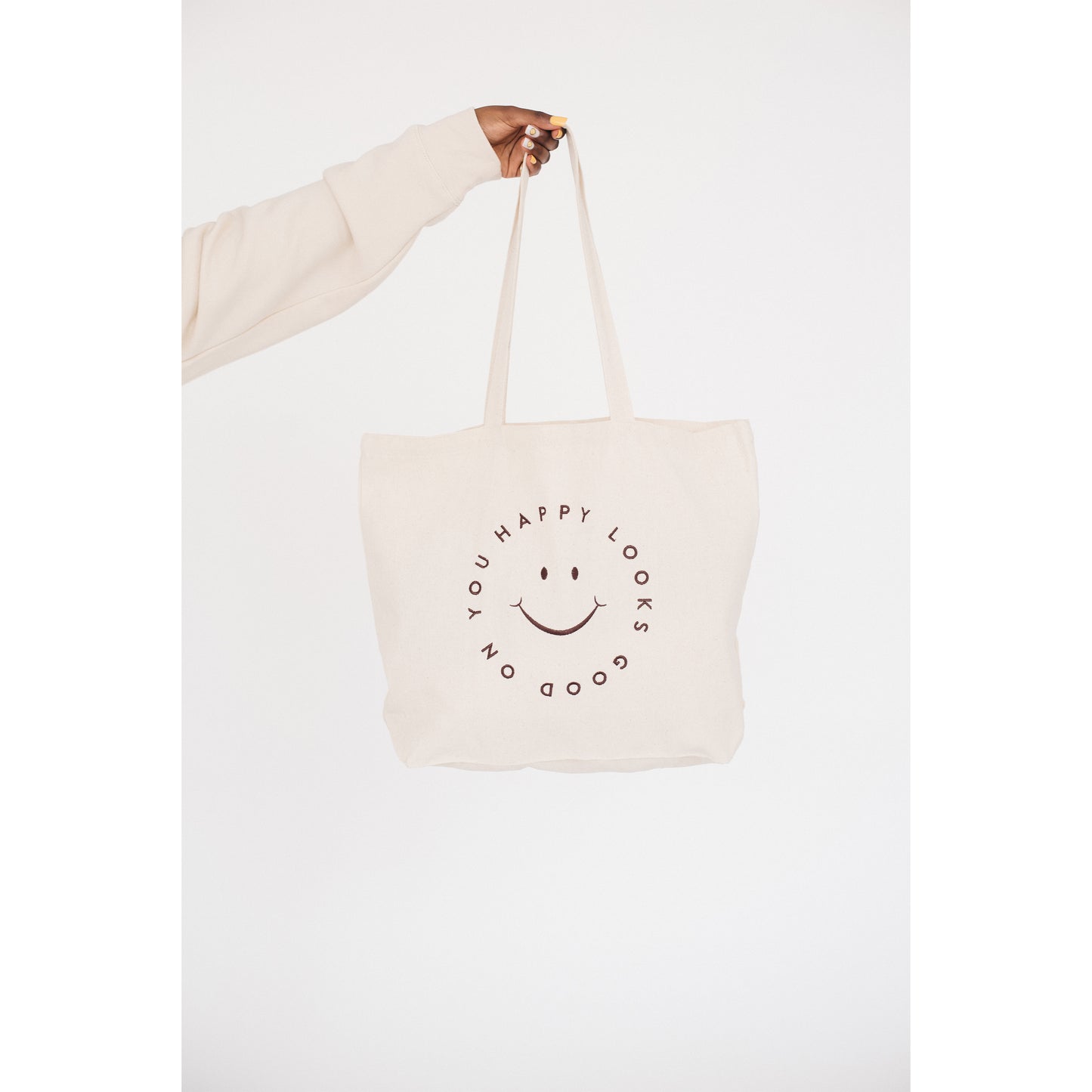 Is The Chicest Accessory Right Now… The Humble Shopping Bag